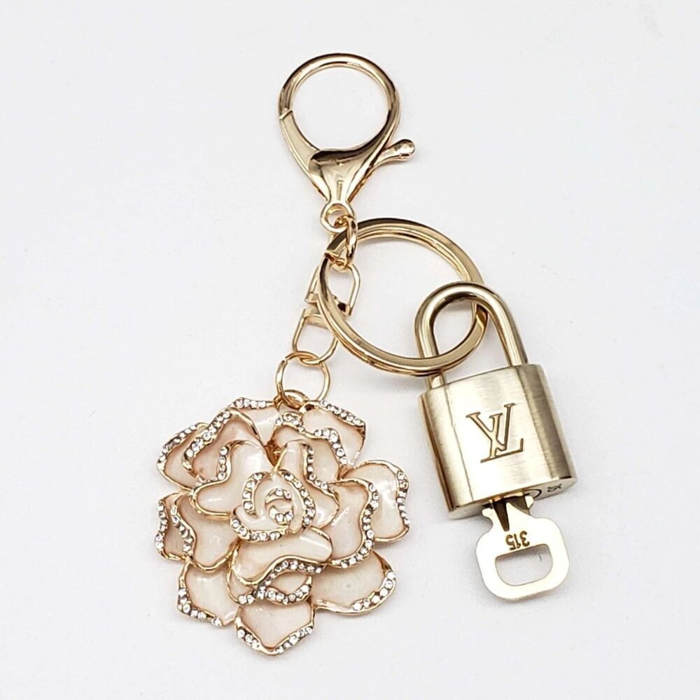 Authentic  Louis Vuitton Lock & Key with unbranded Flower Bagcharm, Keycharm